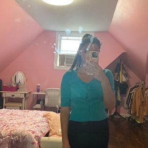 A cute blue sweater, size L. Perfect for any season!!